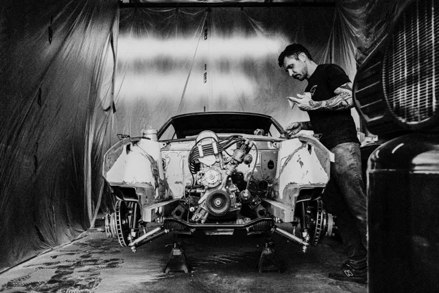 Working on the car in the garage